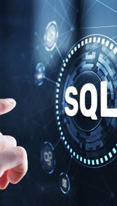 A imagem mostra o dedo de uma pessoa prestes a tocar uma tela em que há uma esfera com a sigla "SQL". Há outras opções em volta, e todas parecem estar em uma tela gigante.